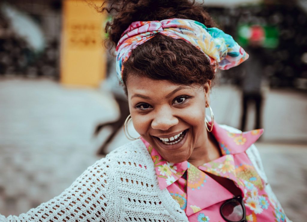 Mental health and life coach in Maryland The Life Calling Coach TLCC Lady with smile experiencing wellness